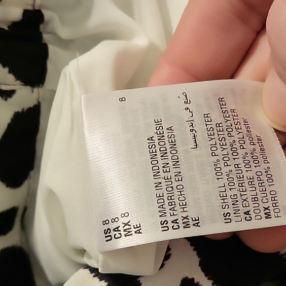 *NWT Inc. Emerald Asymmetrical Giraffe Print Mid Rise Lined Skirt. - Picture 10 of 11